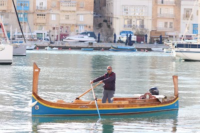 Ride a traditional Dgħajsa across the Grand Harbour